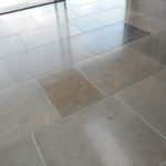 Dark and Light Limestone tiled floor in different tile sizes cleaned and polished in North London