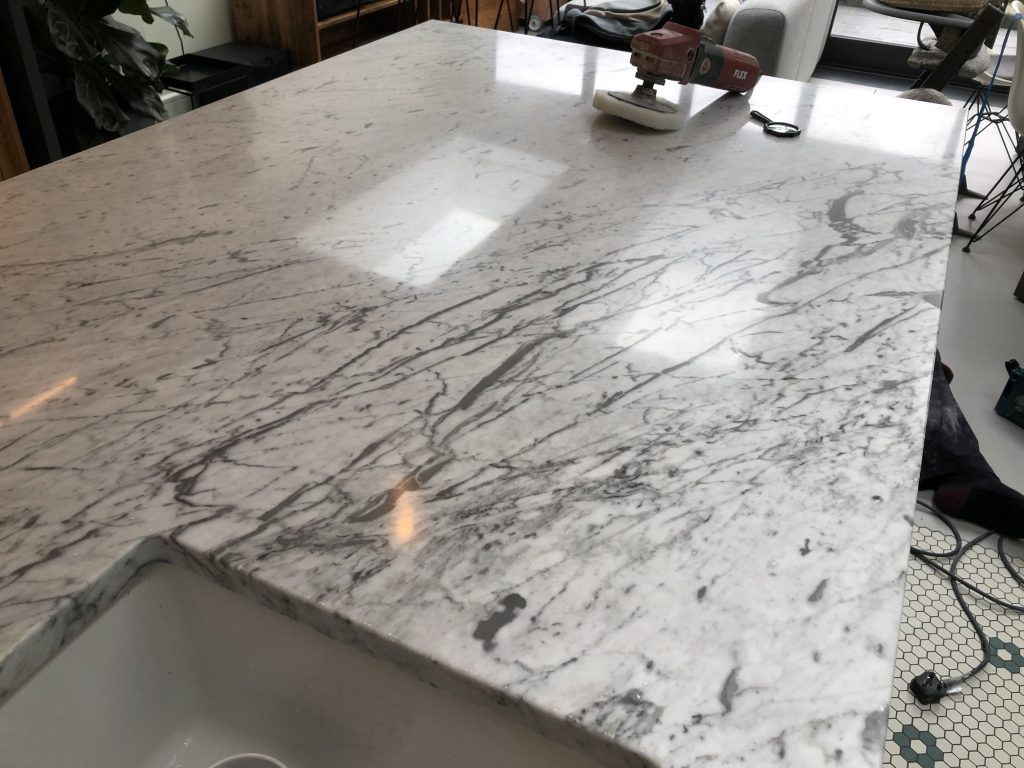 Carrara style marble kitchen worktops polished up in Muswell Hill N10