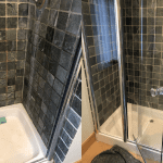 Marble tiled shower and glass door polish