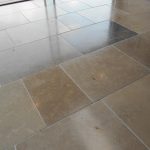 Professional cleaning and restoration of tile and stone. The pic shows loverly limestone tiles in shades of cool brown that have been polished and sealed