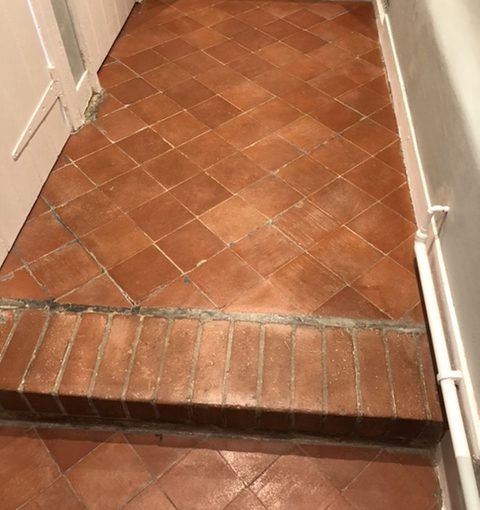 quarry tiles and brick step that has been cleaned and waxed in Radlett WD7