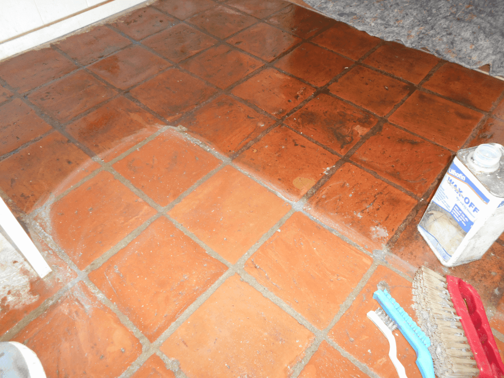 extensive dirt and grime being cleaned from quarry tiles