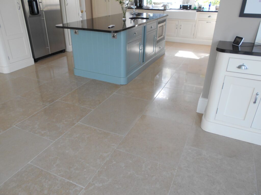 light brown limestone kitchen floor tiles with mid sheen , polished and sealed in St Albans