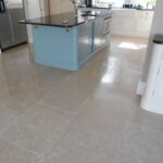 light brown limestone kitchen floor tiles with mid sheen , polished and sealed in St Albans