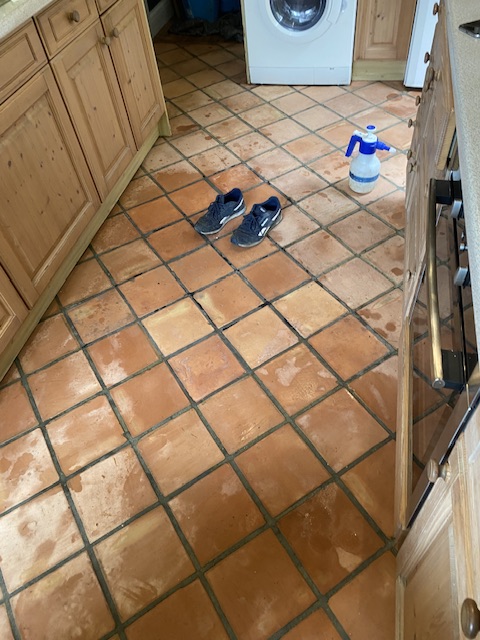 Terracotta kitchen tiles that have been thoroughly deep cleaned and completely stripped of old waxes dirt and oil