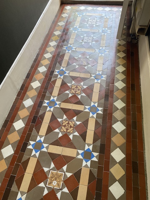 The finished Victorian tiled hallway after waxing and buffing with traditional bees wax