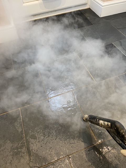 steam cleaning grout lines on slate tiles