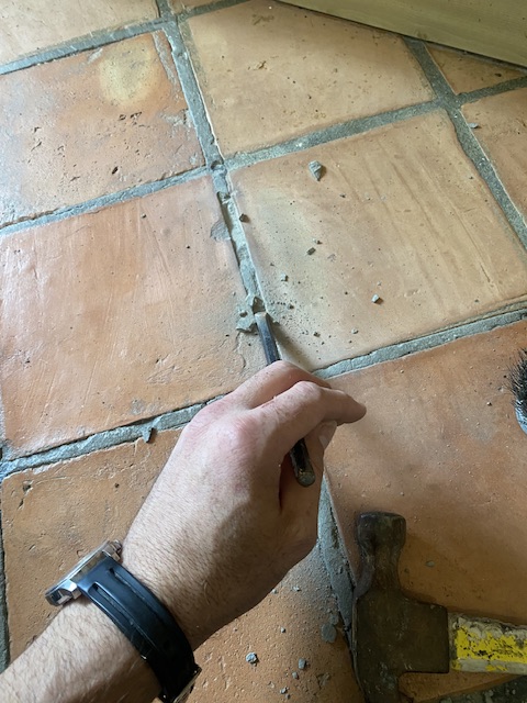The terracotta tiles required some pointing repairs to the grout lines