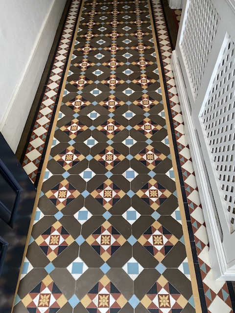 Victorian geometric hallway tiles after cleaning and deep sealing