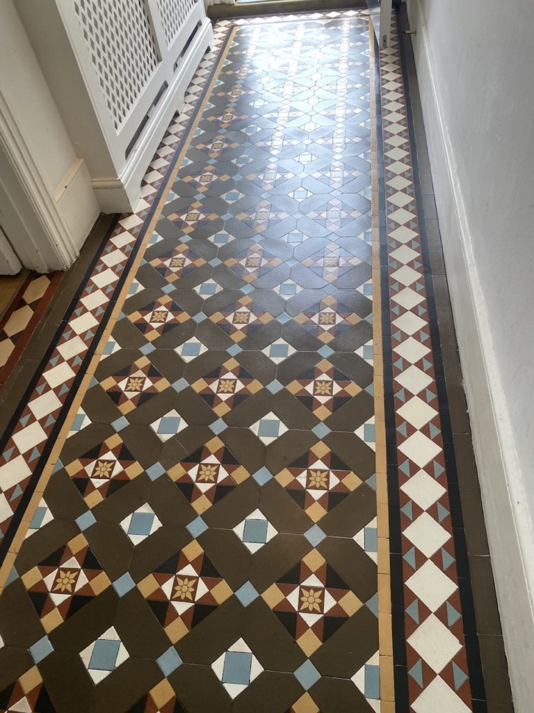 Victorian geometric hallway tiles after waxing with mid sheen