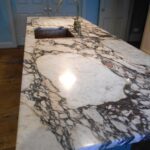 Cararra marble kitchen worktops polished up near Muswell Hill N8- very deeply veigned marble with natural shine in the stone after restoration