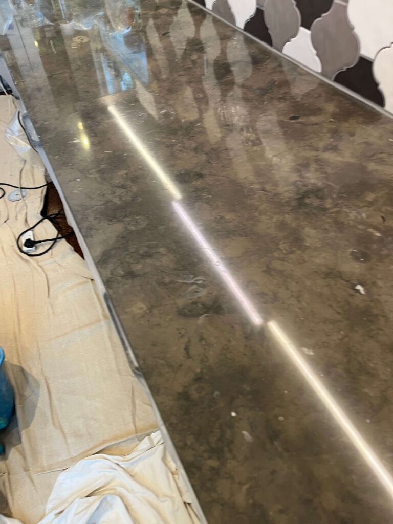 high gloss marble limestone kitchen worksurface that has been polished and crystalised 