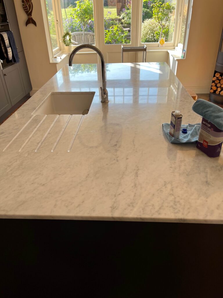 quartz kitchen worktops being sealed, in this Buckinghamshire restoration job